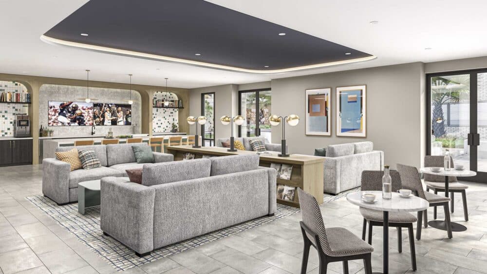 apartment clubhouse with tables and seating and community kitchen amenities